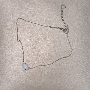 Gold Kendra Scott necklace with white stone